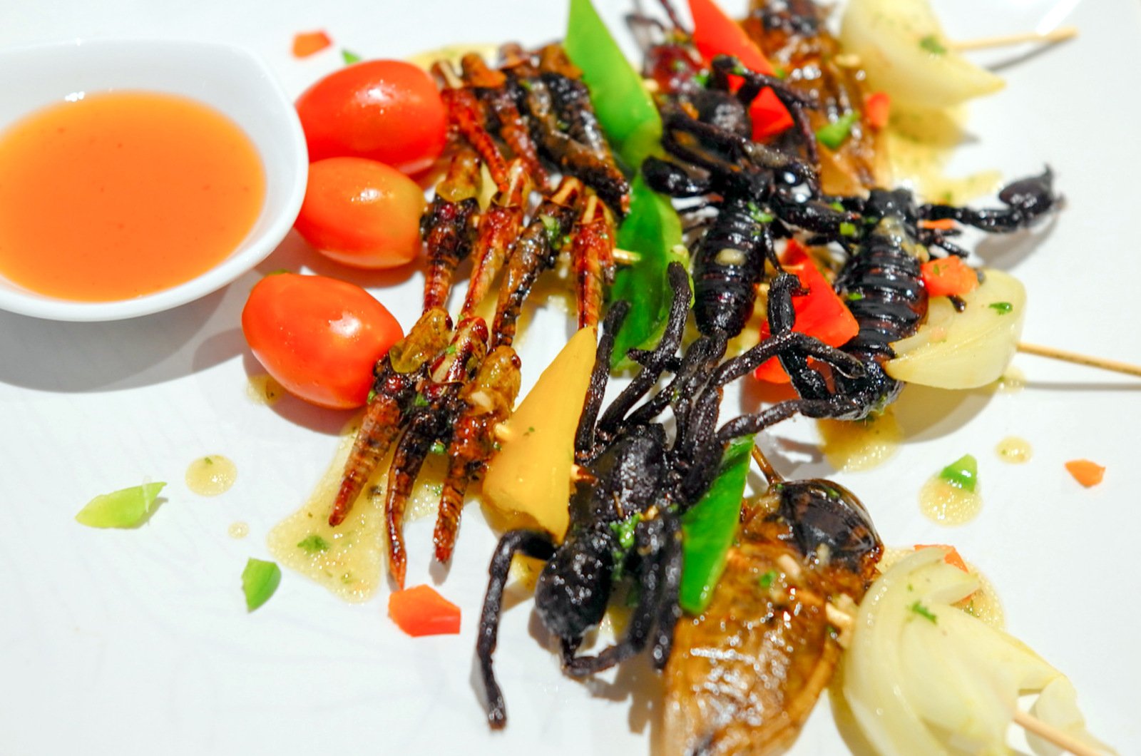 Enjoy scorpion salad at Bugs Cafe